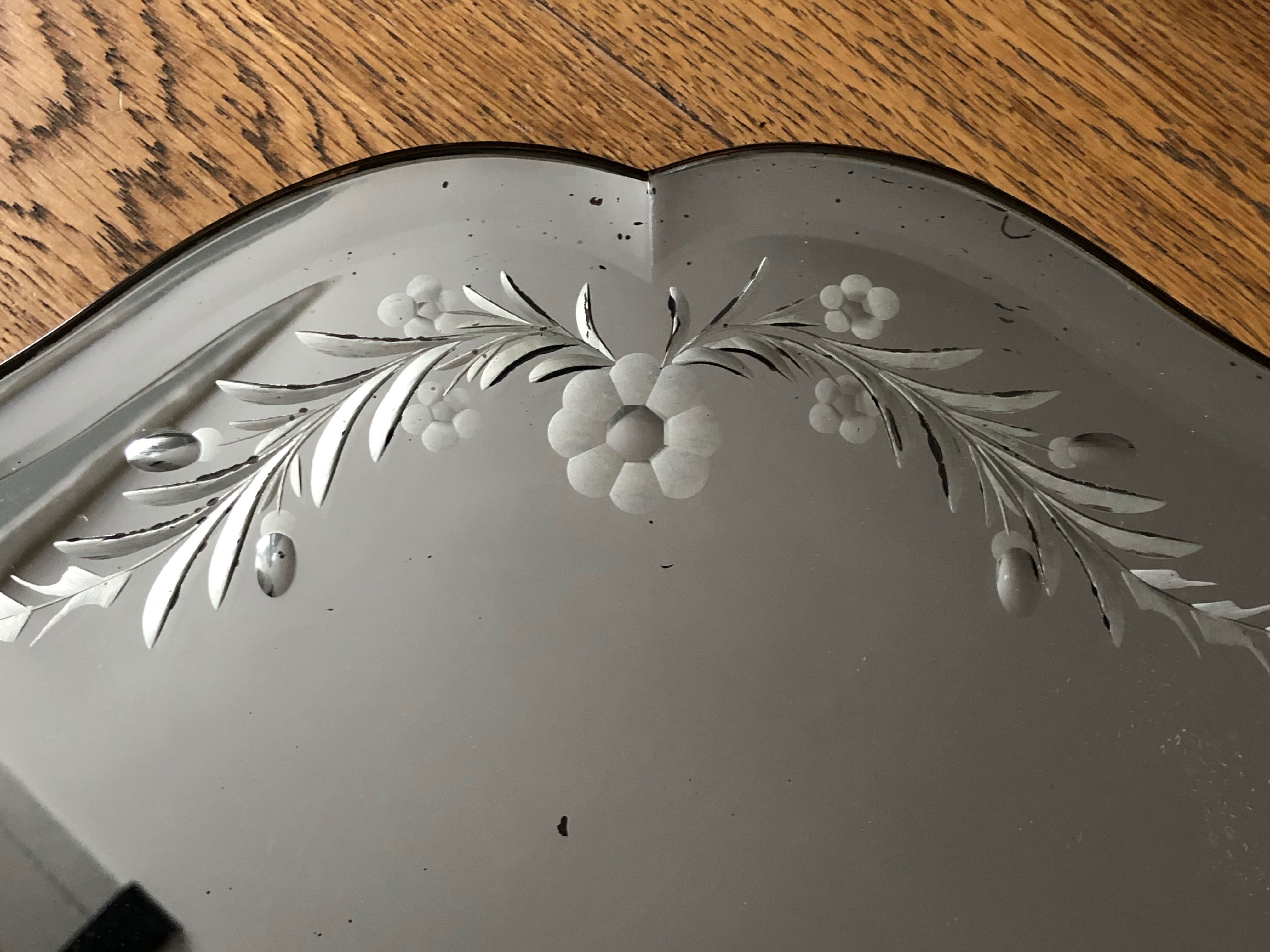 Old bevelled and engraved mirror   43x63cm