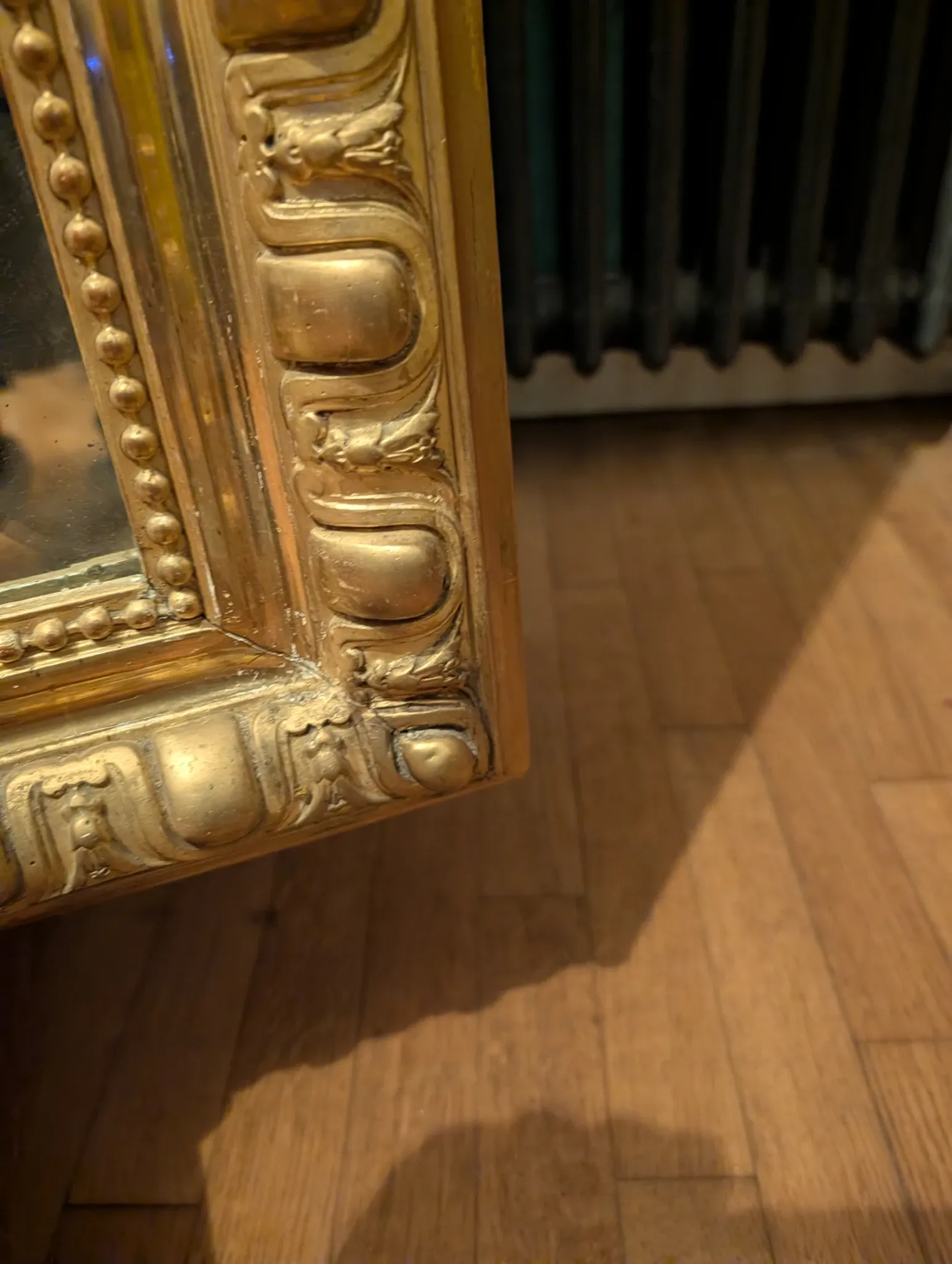 Large antique gilded mirror in Louis XV style