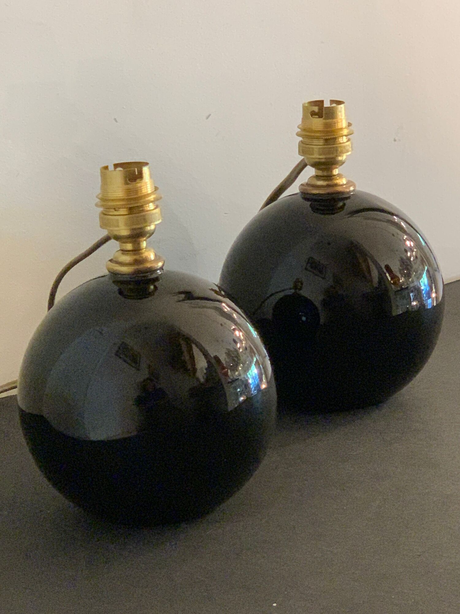 Pair of feet of black opaline art deco lamps