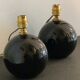 Pair of feet of black opaline art deco lamps