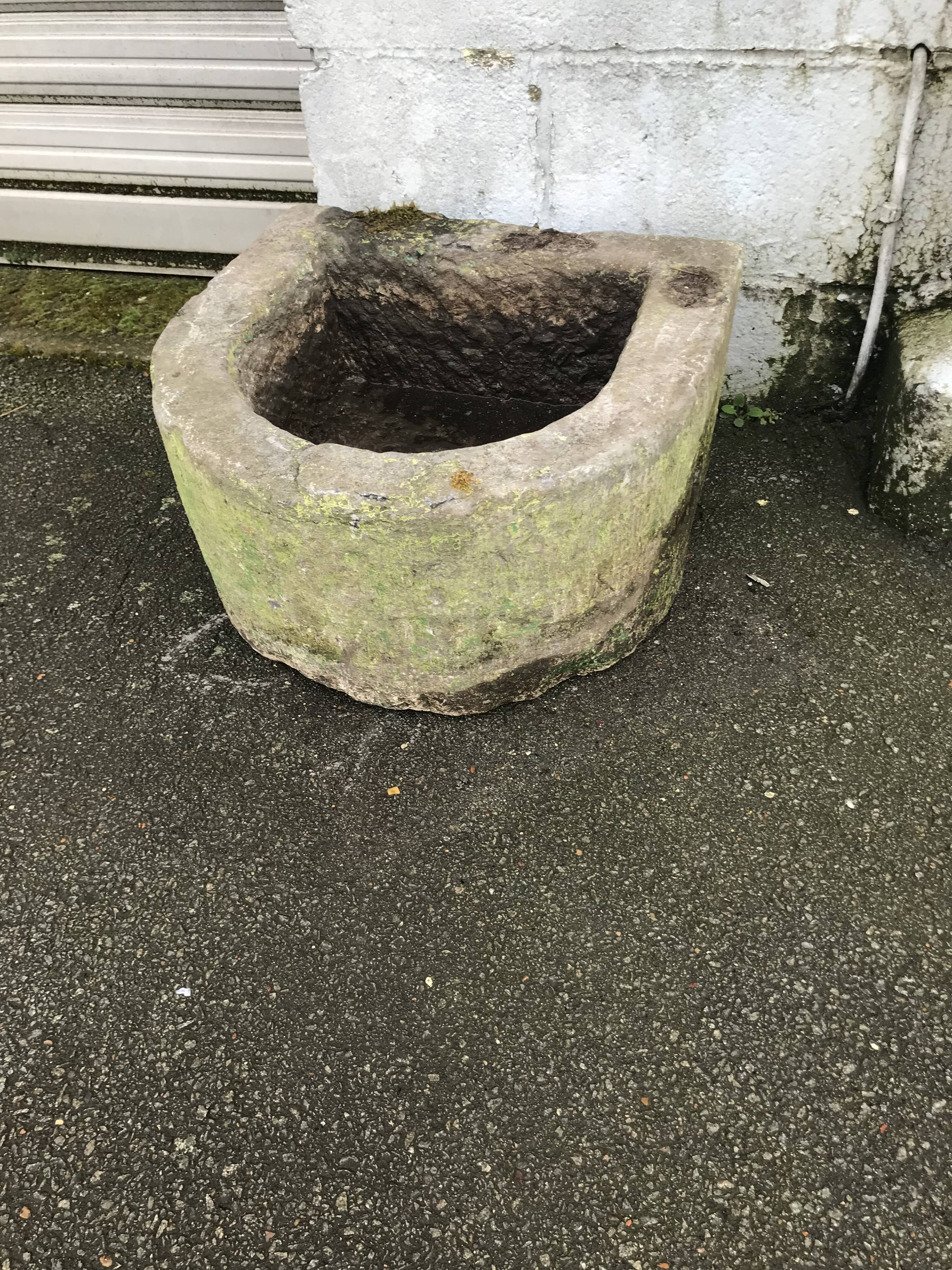 Old blue stone bin