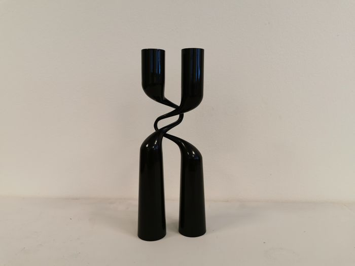 Set of two black design candlesticks, designed by mikaela dörfel for menu, denmark.