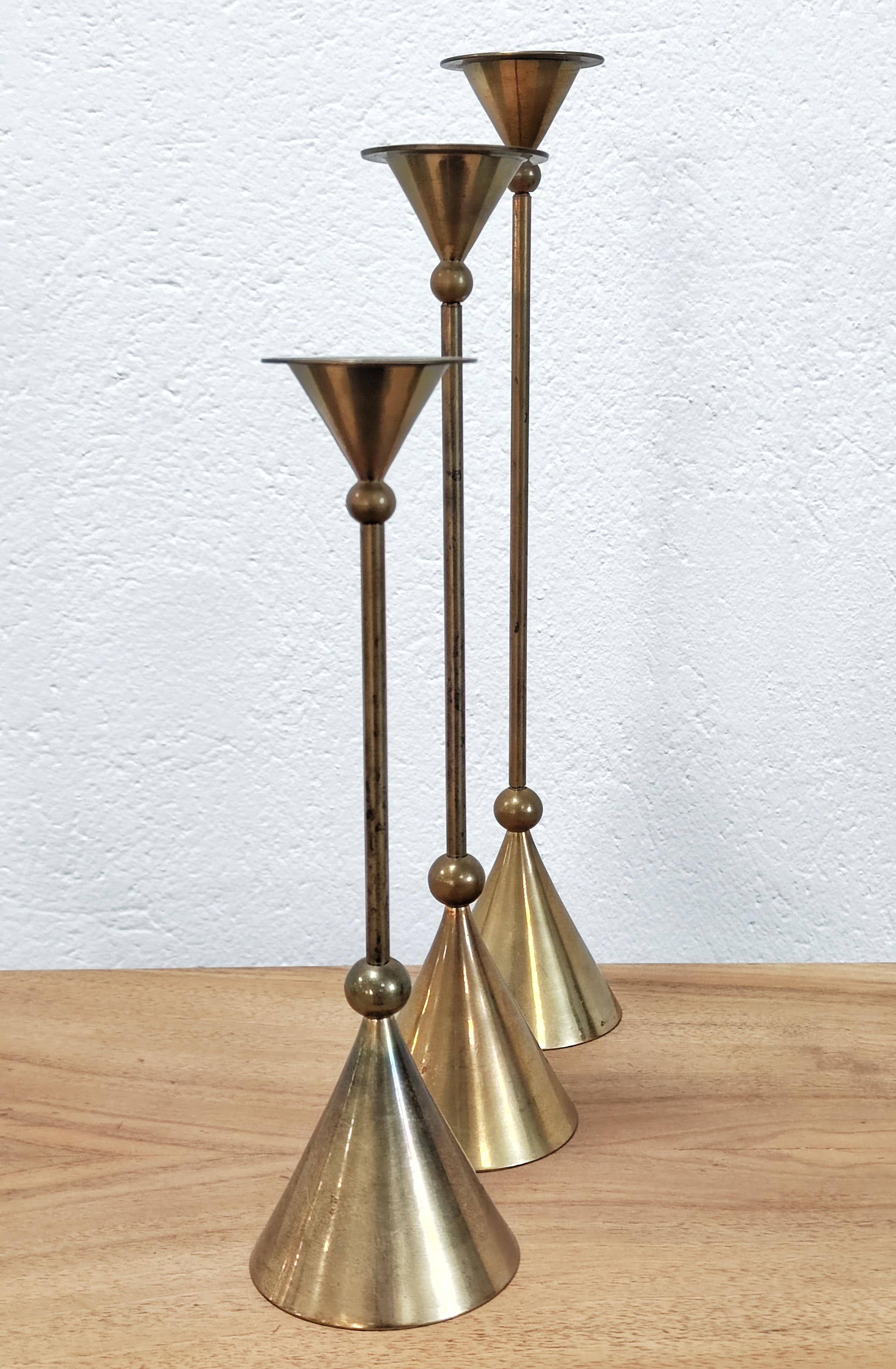 Set of three bronze candlesticks by Christian de Beaumont from the 1980s.