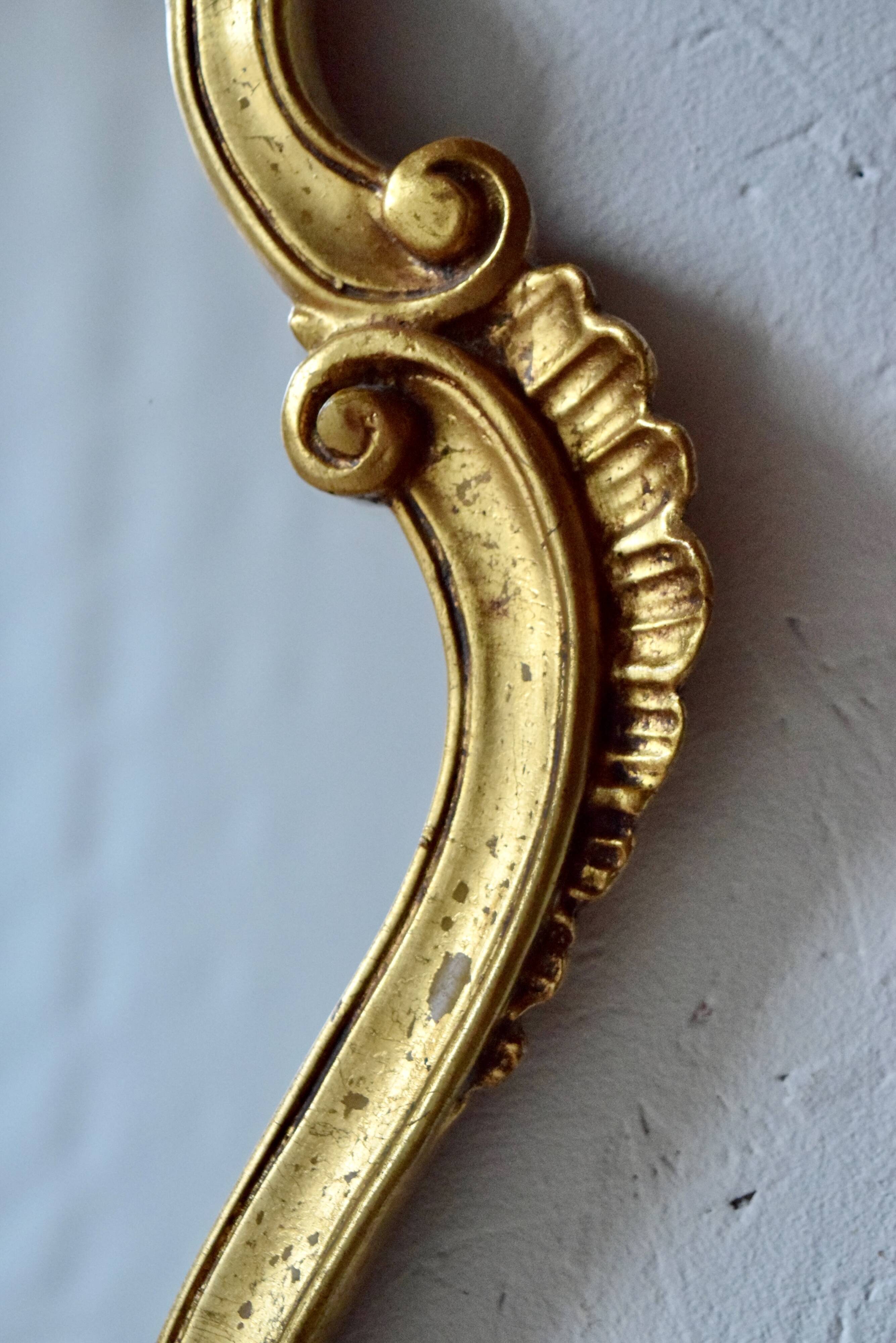 Old wall mirror in golden resin - rococo style