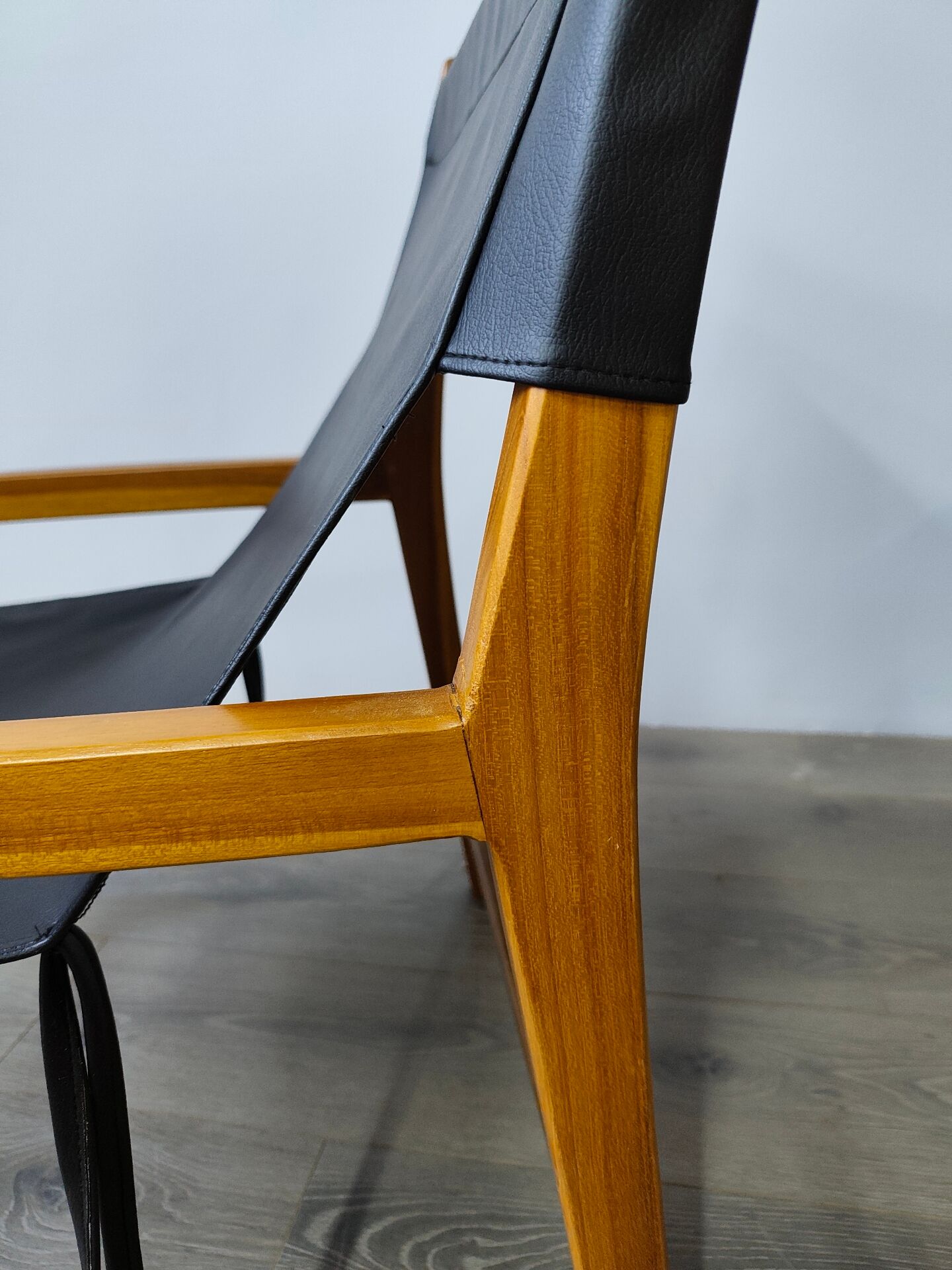Leather and teak armchair