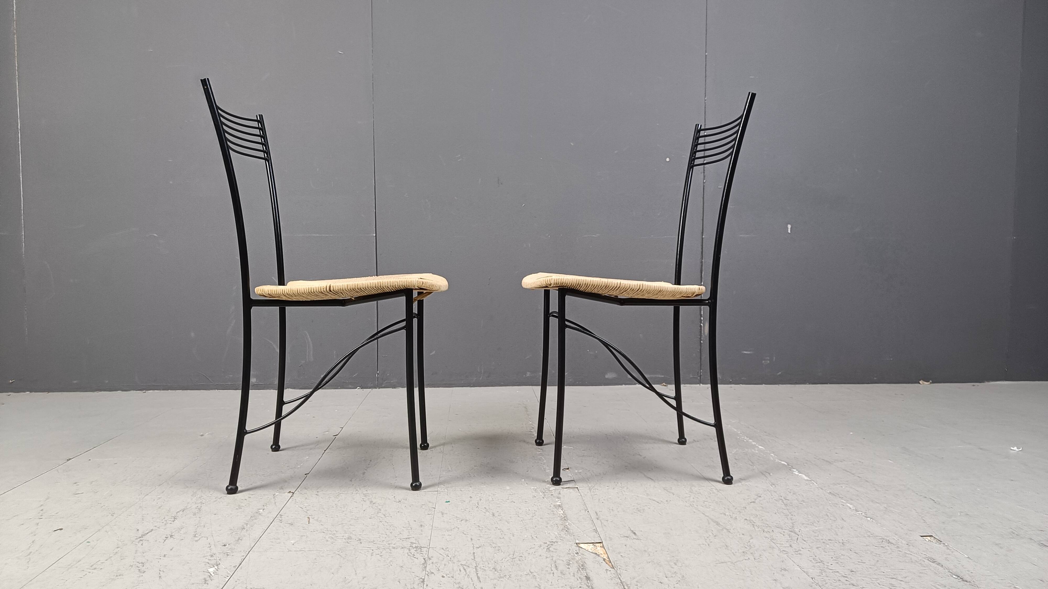 Vintage black metal and wicker italian bistro chairs.  Beautiful, elegant i