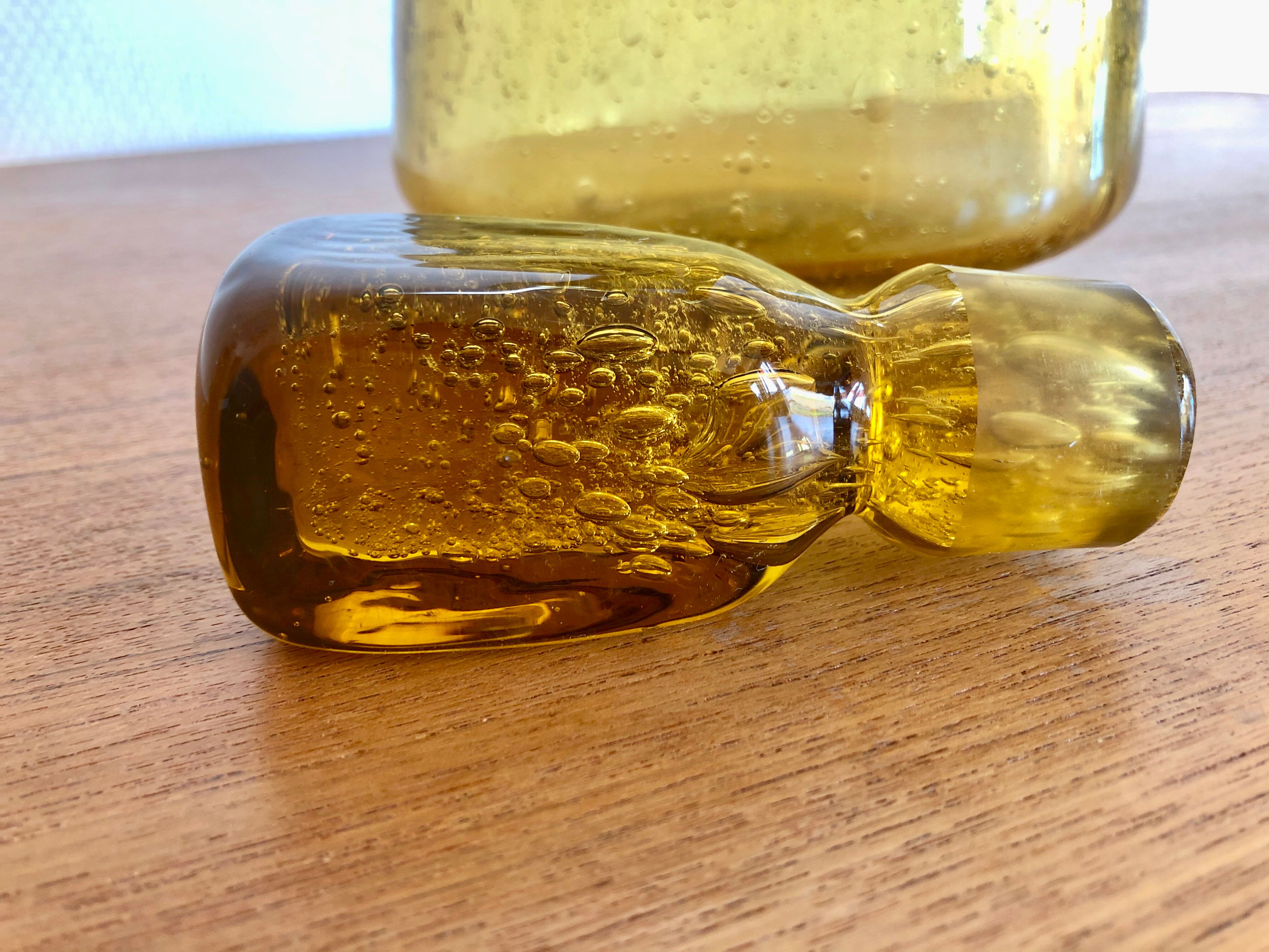 Yellow blown glass decanter