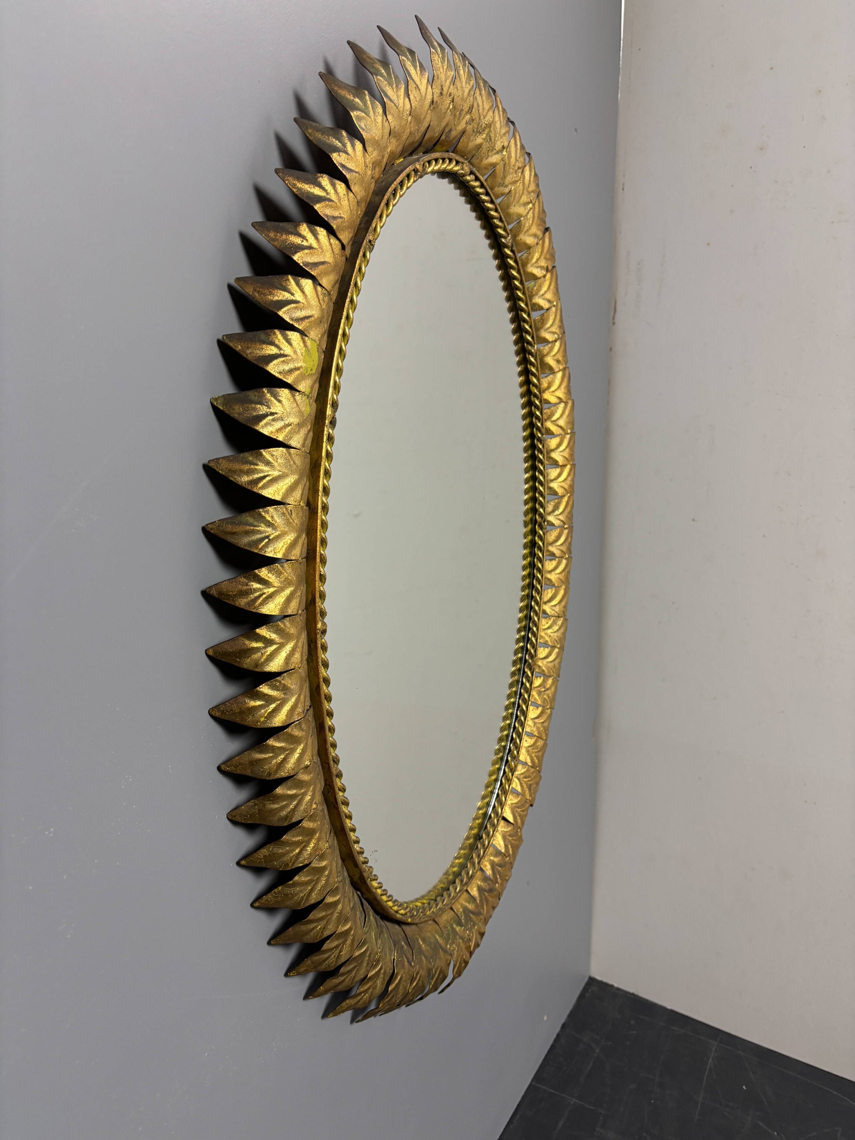 Midcentury bohemian hollywood regency spanish gilt metal sun mirror, 1960s