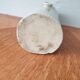 Vintage bottle in enamelled sleet