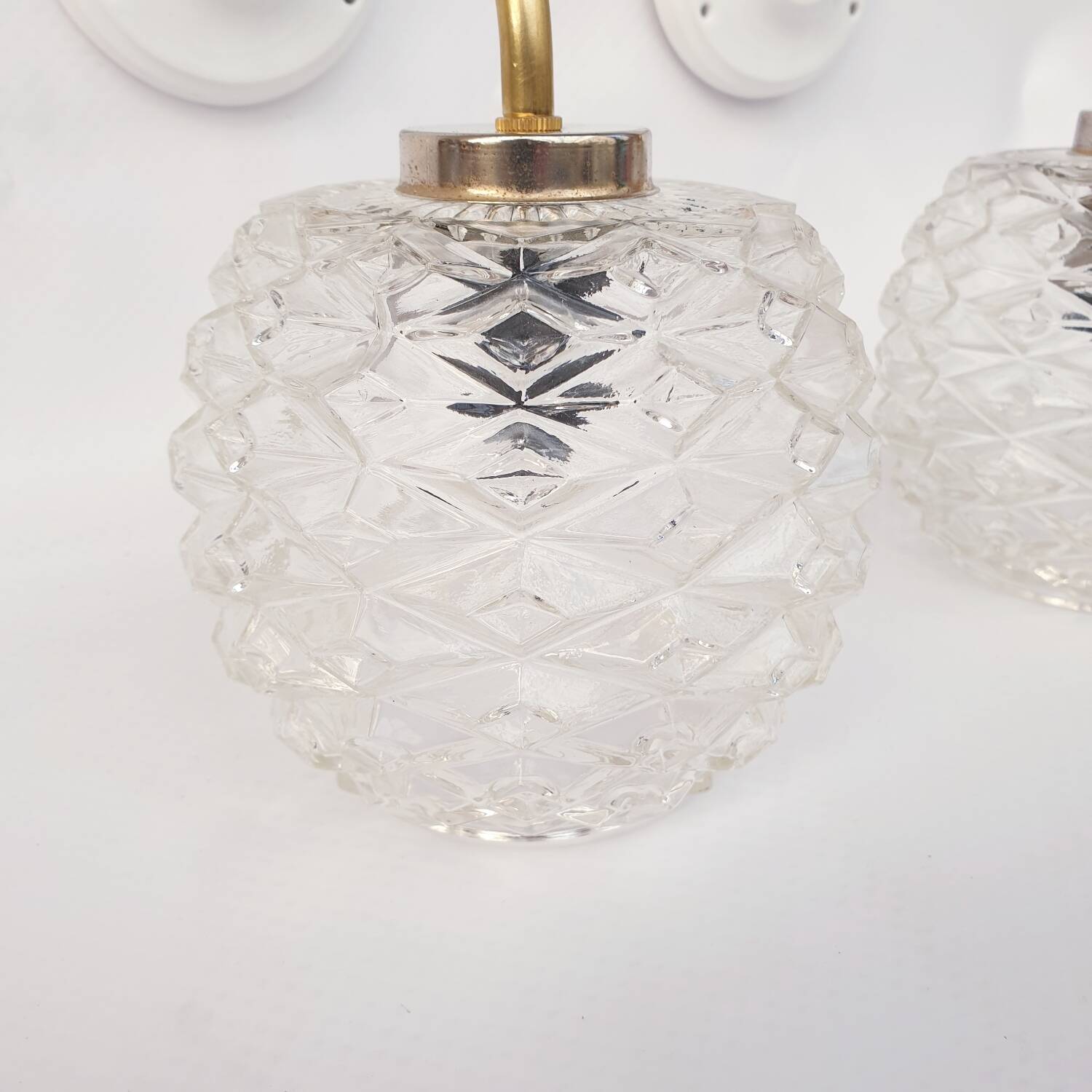 Swan neck and glass wall lights