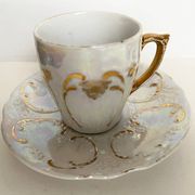 Paire de tasses en porcelaine