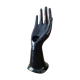 Hand holds black jewelry, ring sizer, soliflore, vintage French, 50s