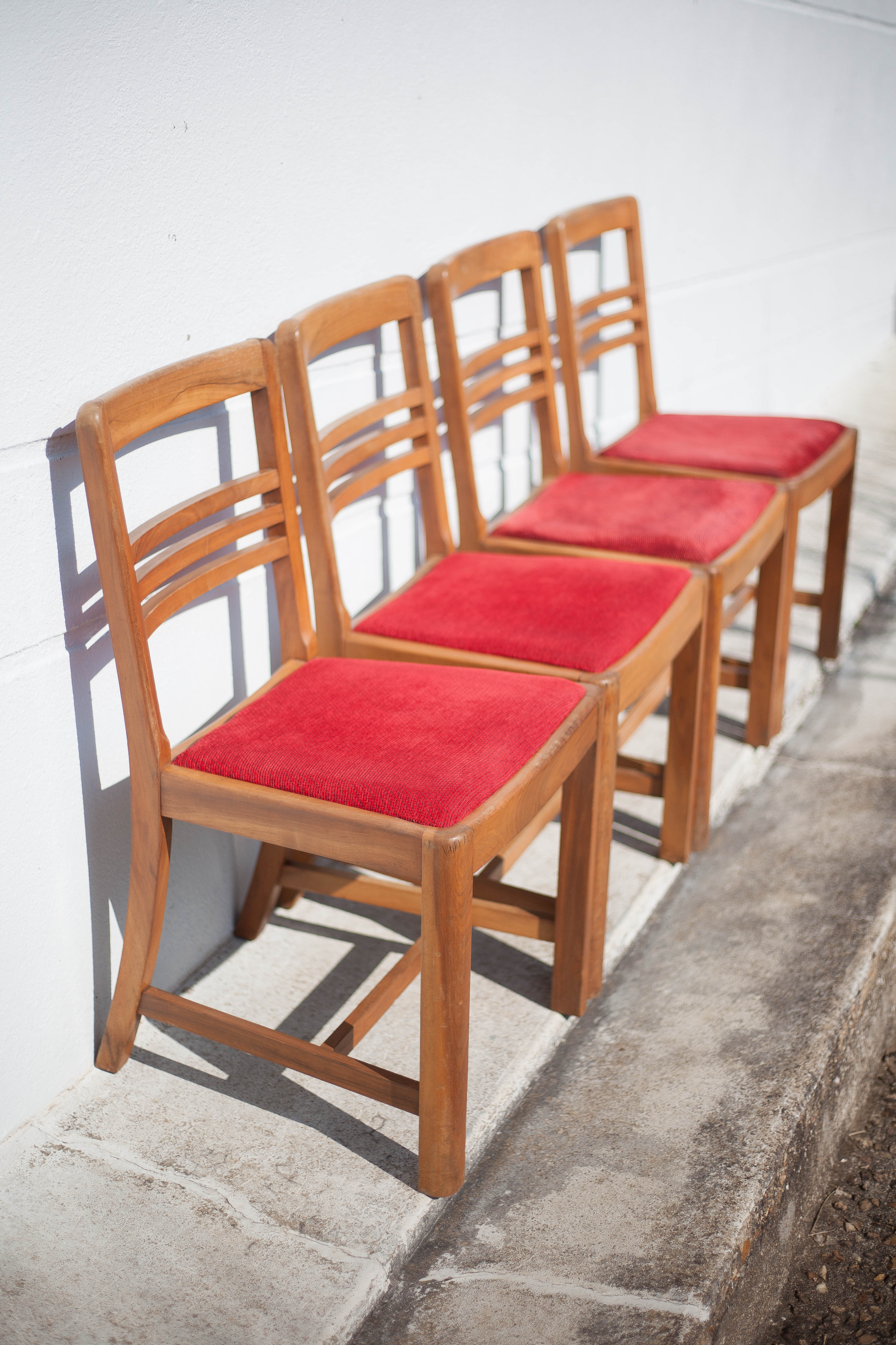 4 wooden chairs and velvet fabric