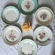 Pitted old flat earthenware plates with gold