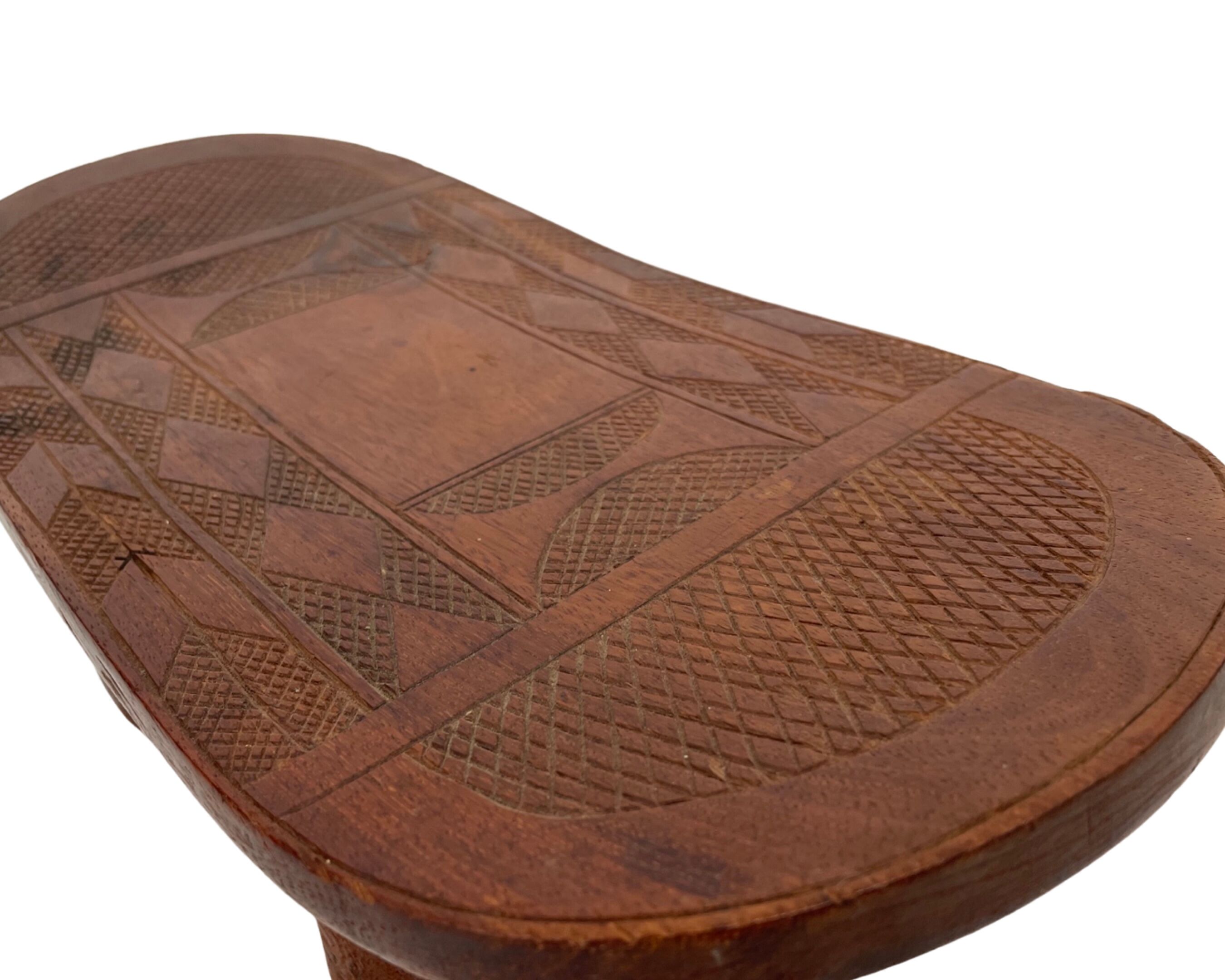 Vintage African hand-carved wooden Senufo stool bench design