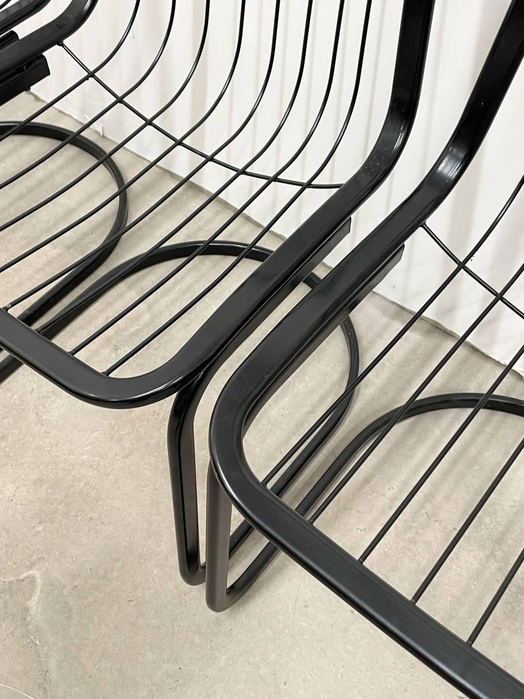 4 black wire metal chairs
