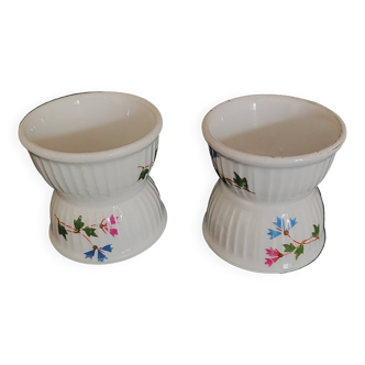Pair of porcelain diabolo egg cups decorated with 20th century barbels