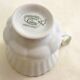 Tea cup, solitary service, naturalistic decoration, in Limoges porcelain.