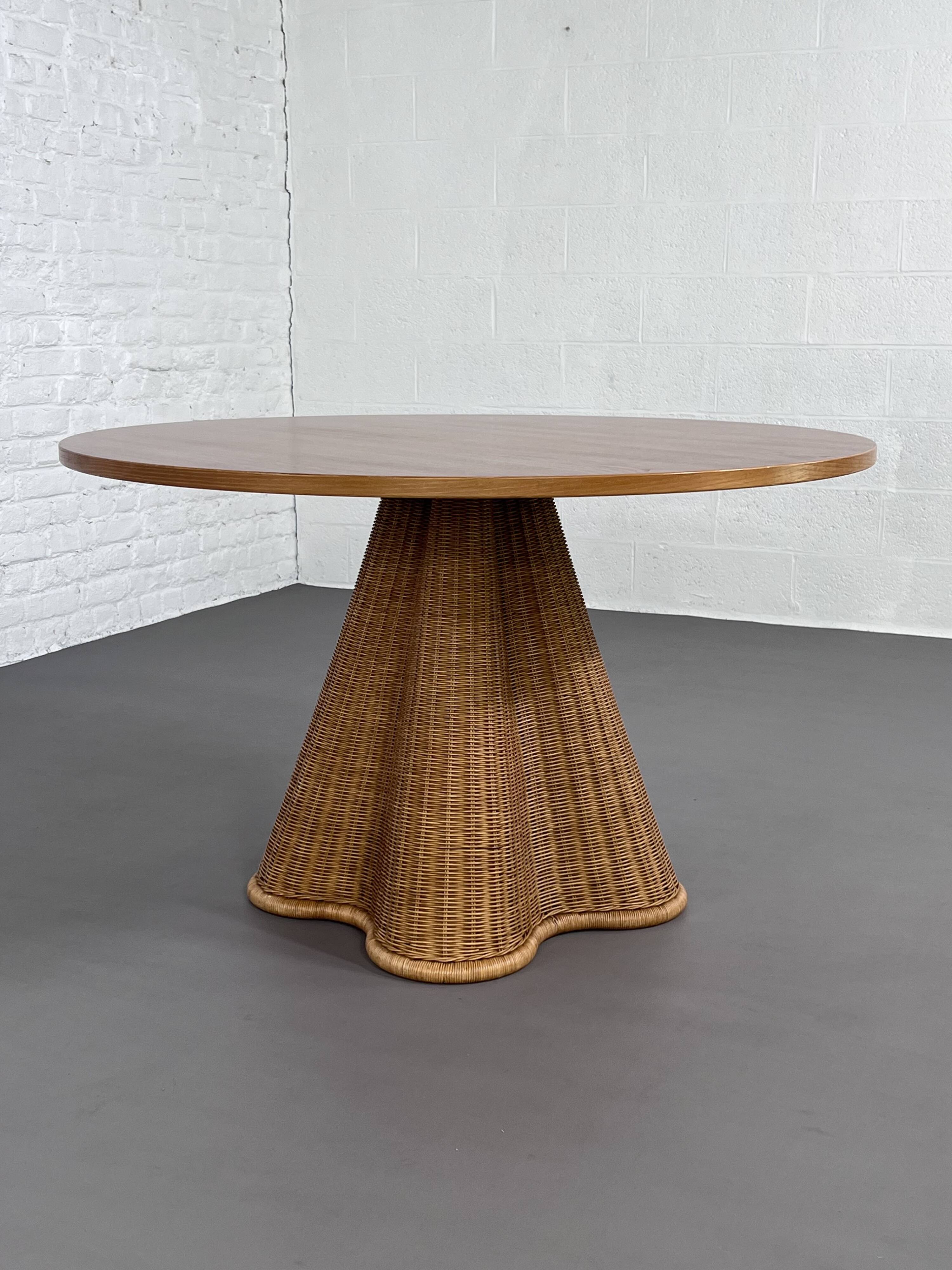Italian design round table in wood and rattan
