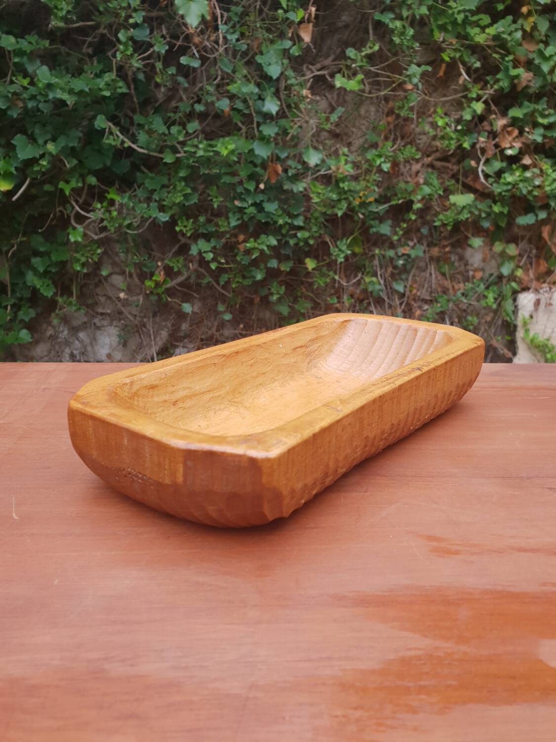 Vintage wooden pocket emptier