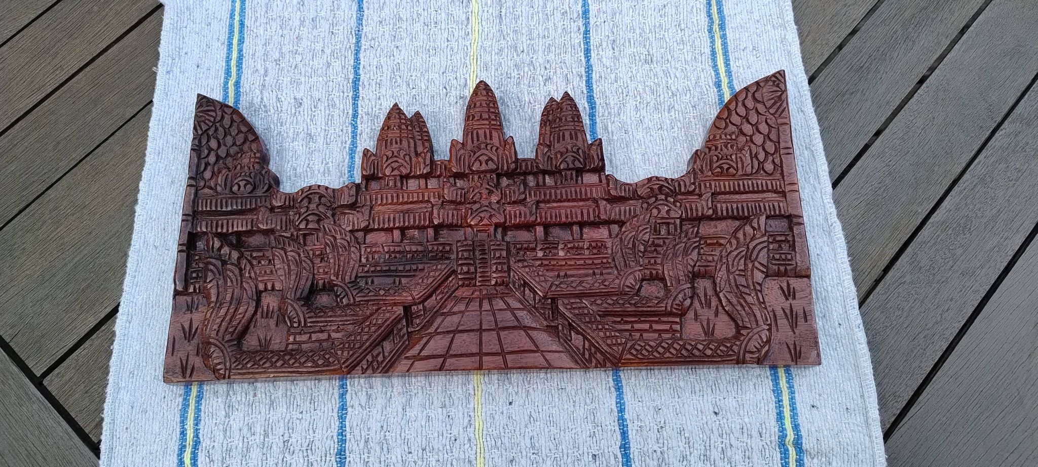 Carved wooden relief, reproduction of the Angkor Wat temple.