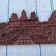 Carved wooden relief, reproduction of the Angkor Wat temple.