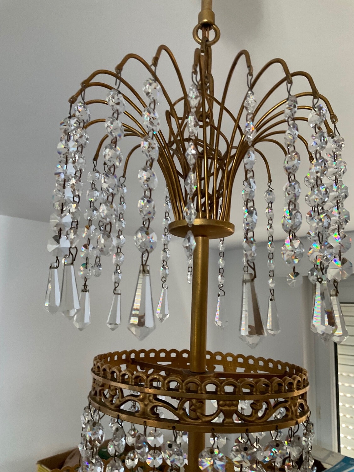 Cascade chandelier with crystal and bronze tassels