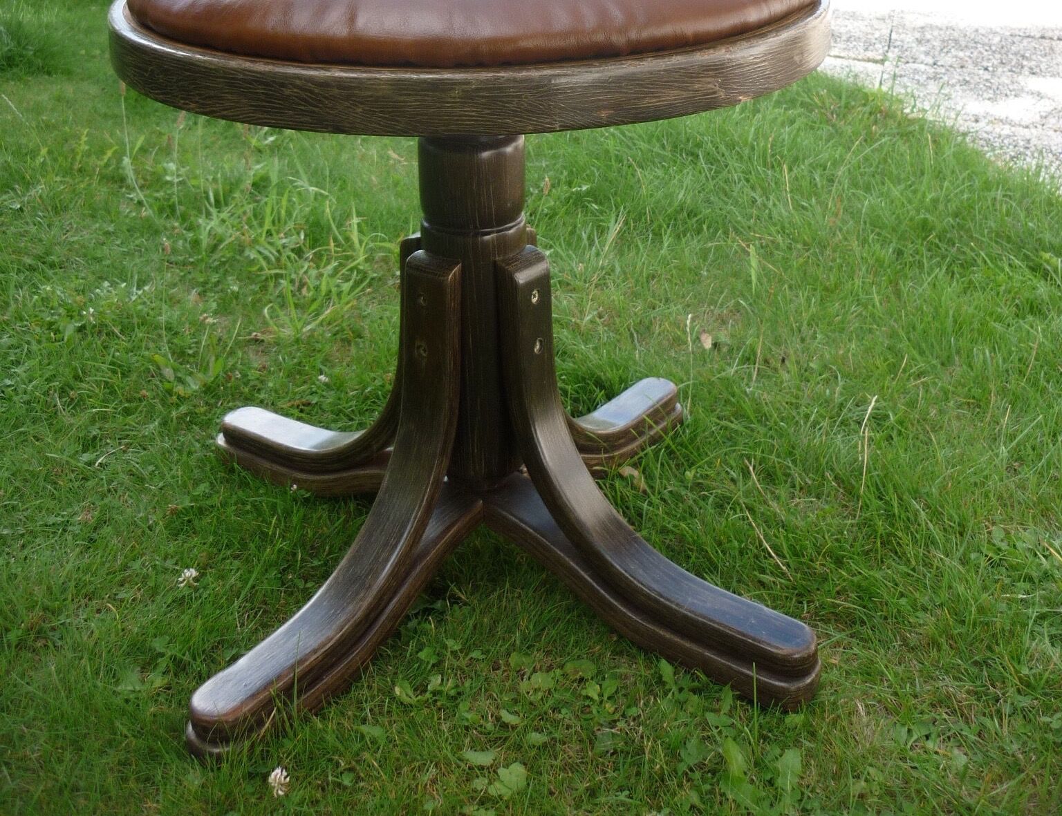 Swivel leather armchair