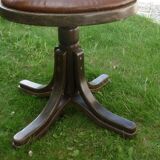 Swivel leather armchair