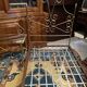 One person romantic bed with bedside table brass bedroom chair