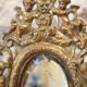 Miroir en bronze à décor d'angelots et mascarons fin 19ème siècle