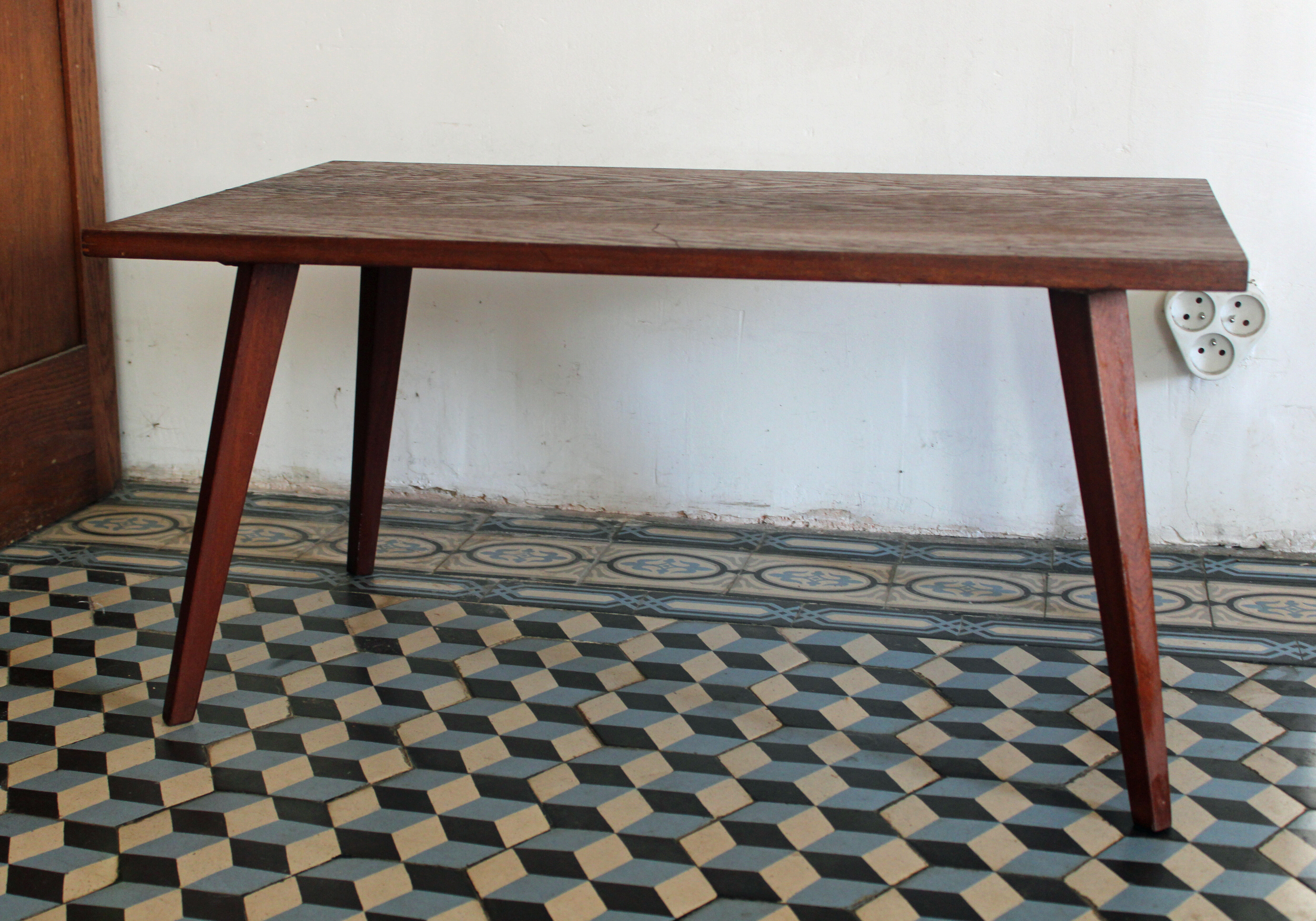 Teak coffee table with compass feet
