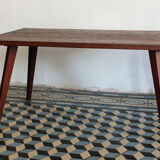 Teak coffee table with compass feet