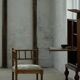 Antique French corner chair handcrafted with lamb's wool, early 20th century.