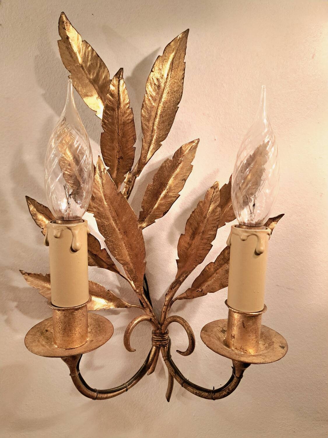 Pair of gold-tone metal leaf wall sconces