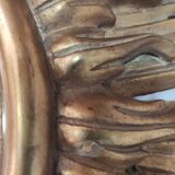 Sun mirror and witch's eye in gilded wood