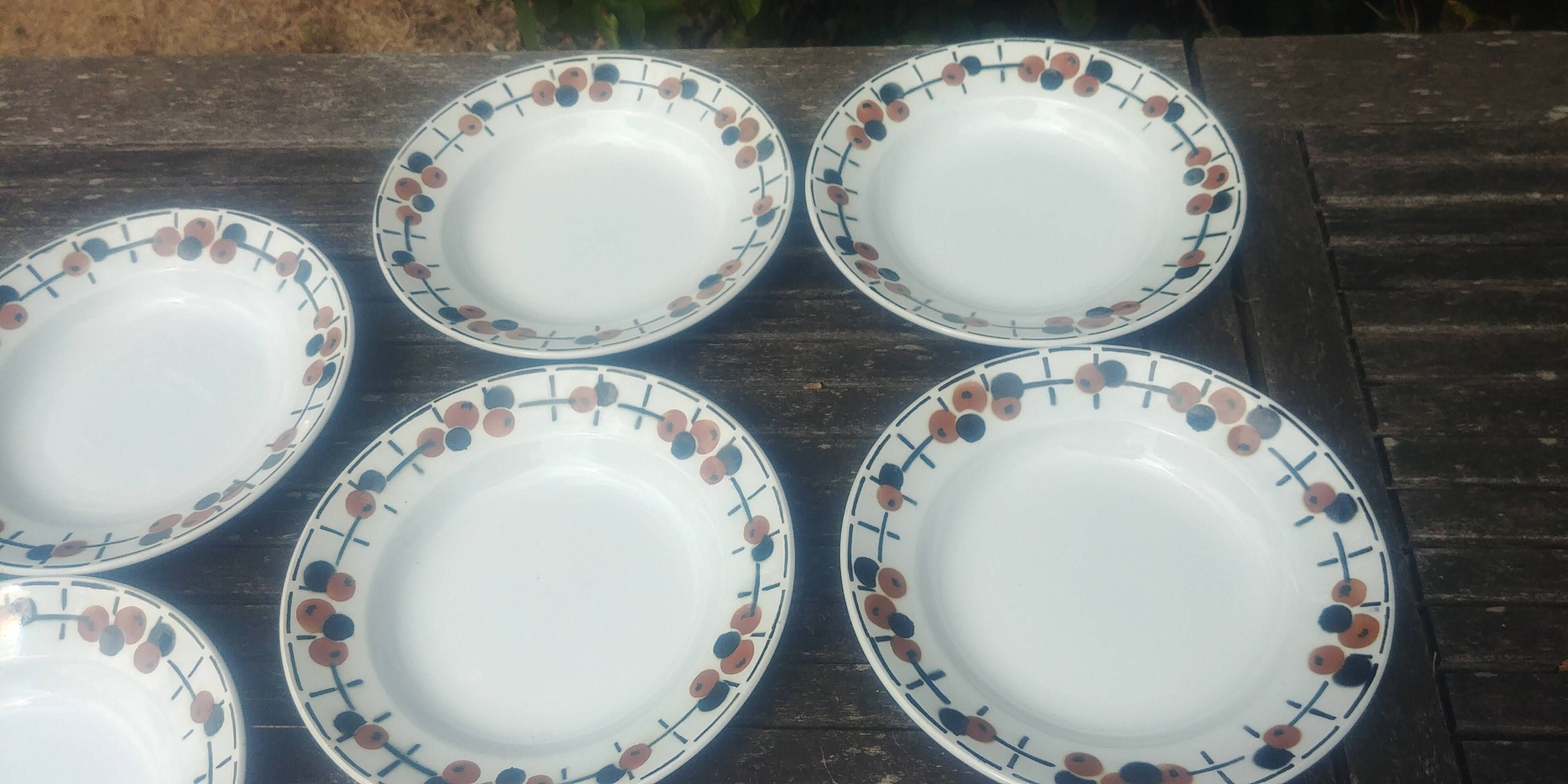 Set of eight ironstone soup plates from the Saint Amand earthenware factory