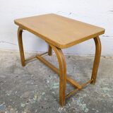 Old curved wooden children's desk.