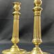 Pair of 19th century gilt bronze candlesticks with fluted shafts, Restoration
