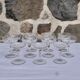 Set of 11 carved glass champagne glasses