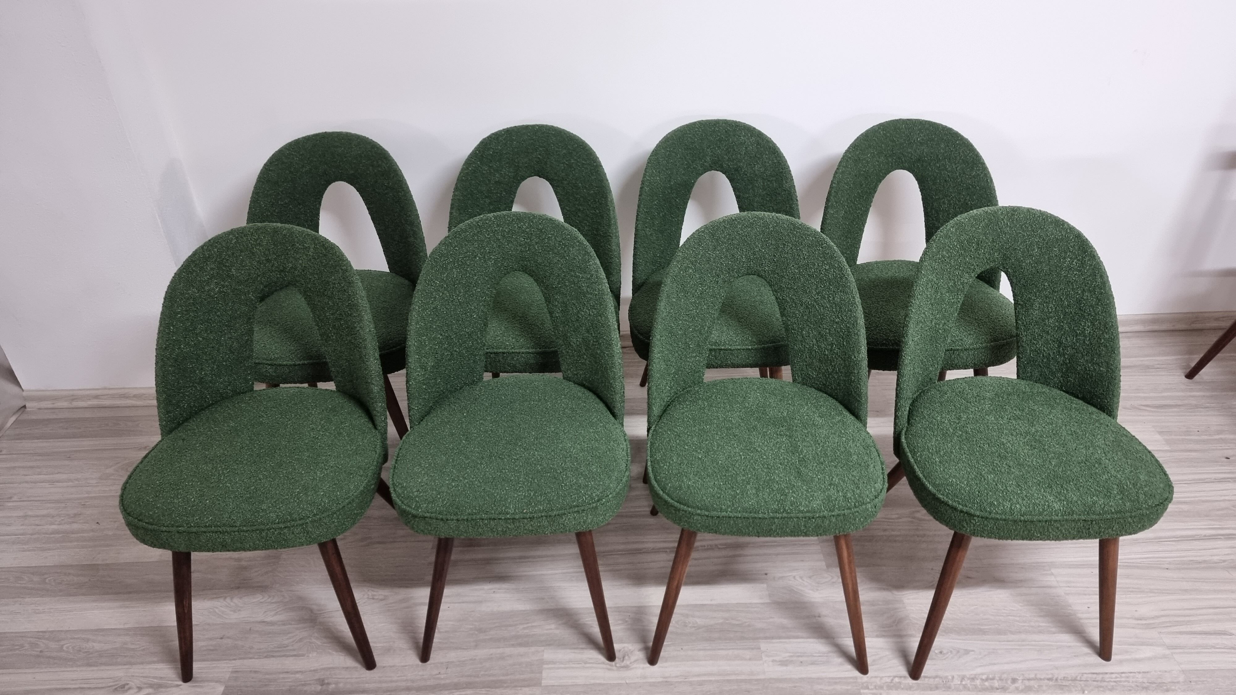Dining chairs by Antonin Suman