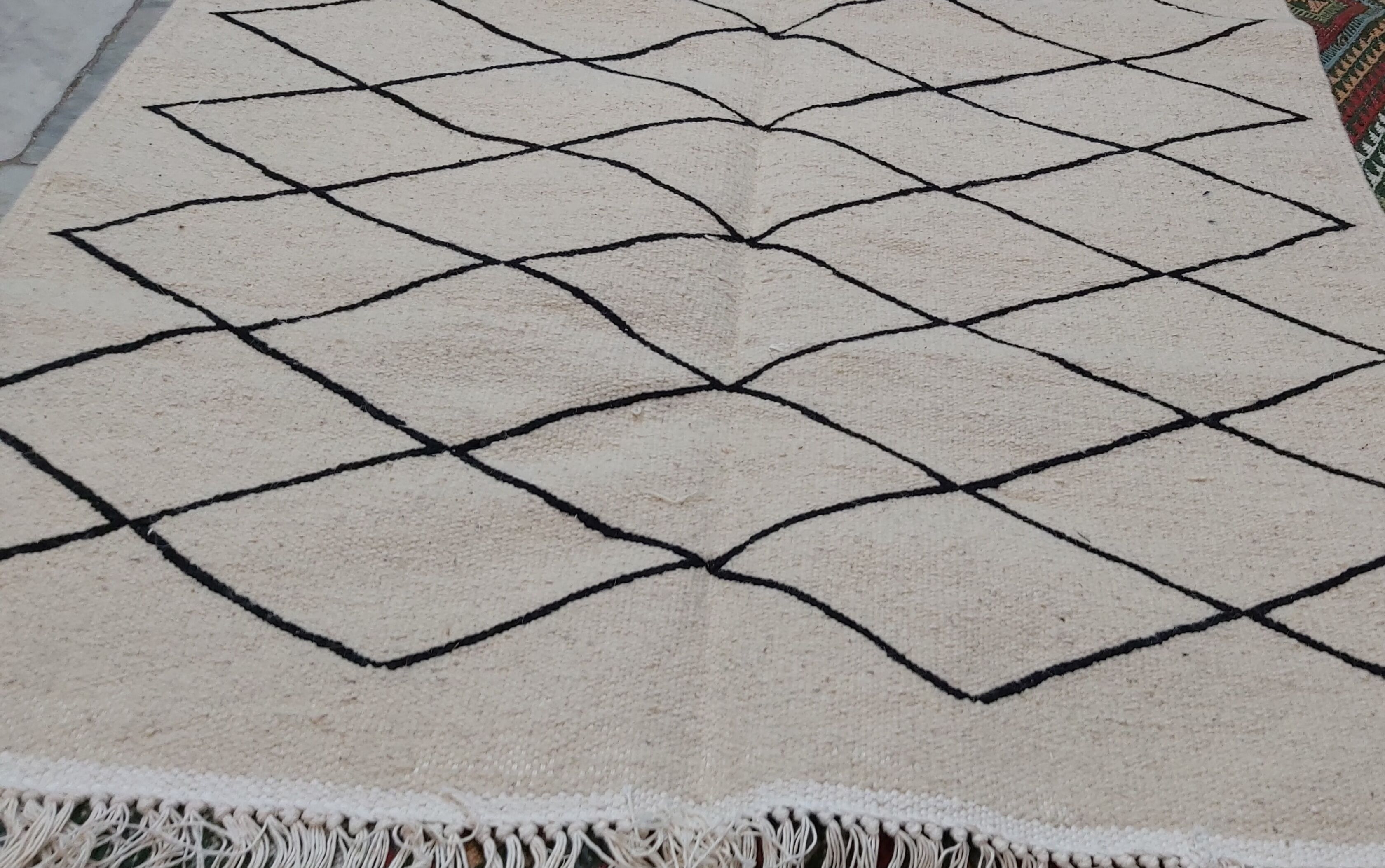 Handmade moroccan beige and black wool rug 192x118cm