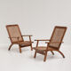 pair of french mahogany and cane armchairs, 1950s
