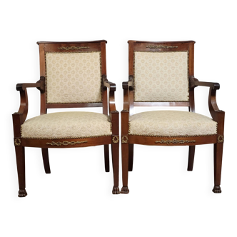 Paire de fauteuils d’époque Empire, en acajou et bronzes dorés