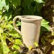 Ceramic pot with handle