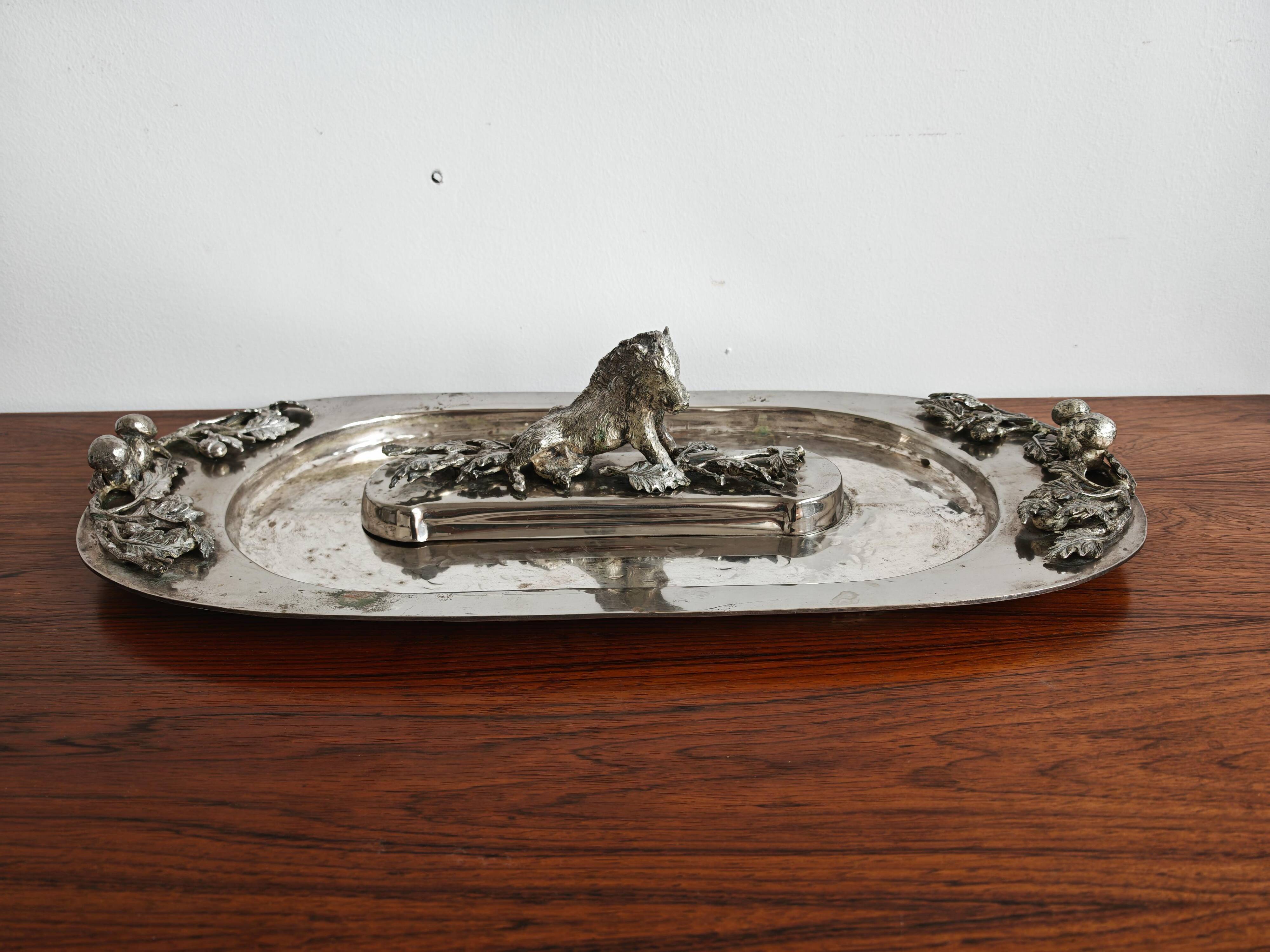 Silver serving dish by Franco Lapini with boar sculpture.
