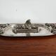 Silver serving dish by Franco Lapini with boar sculpture.