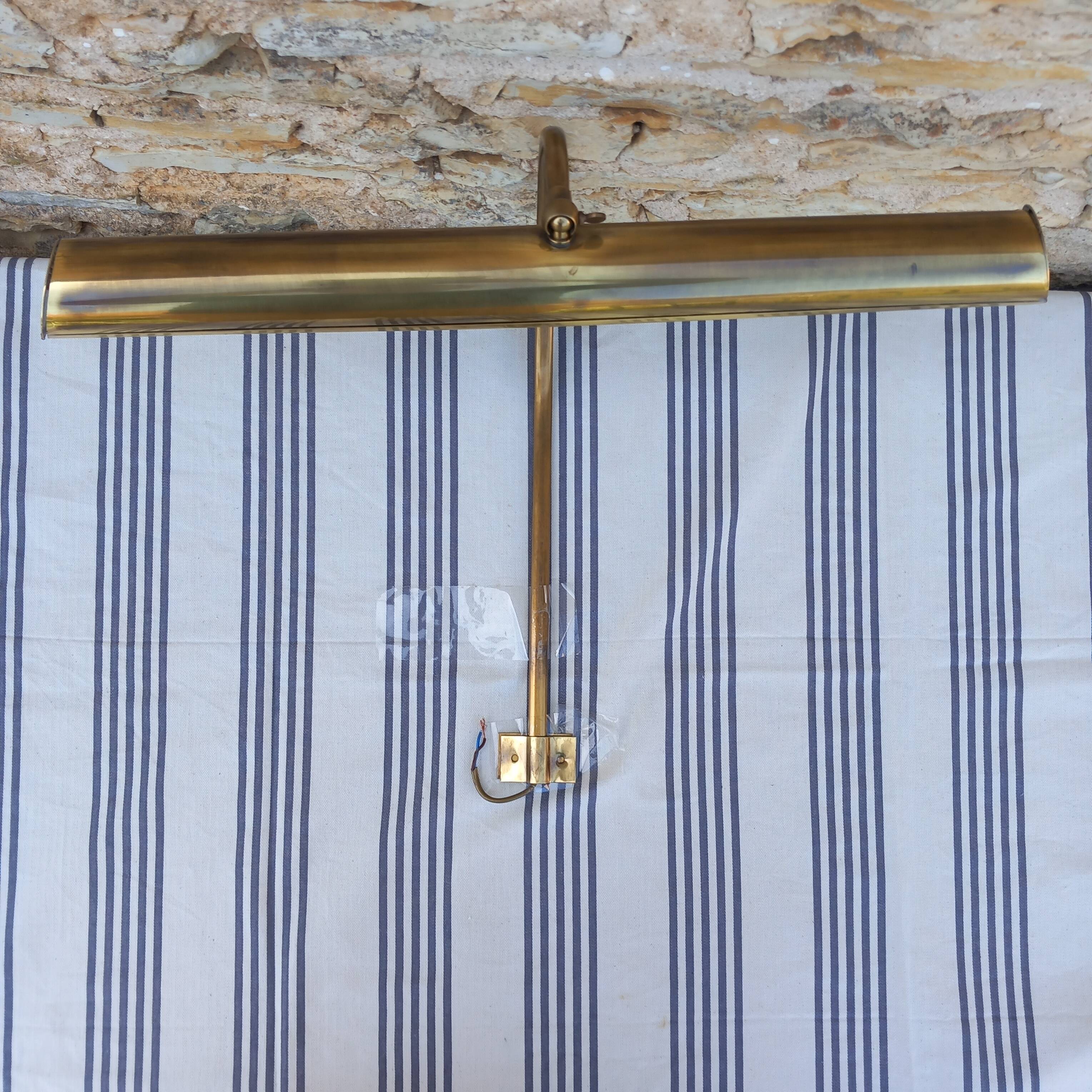 Brass wall light for picture lighting