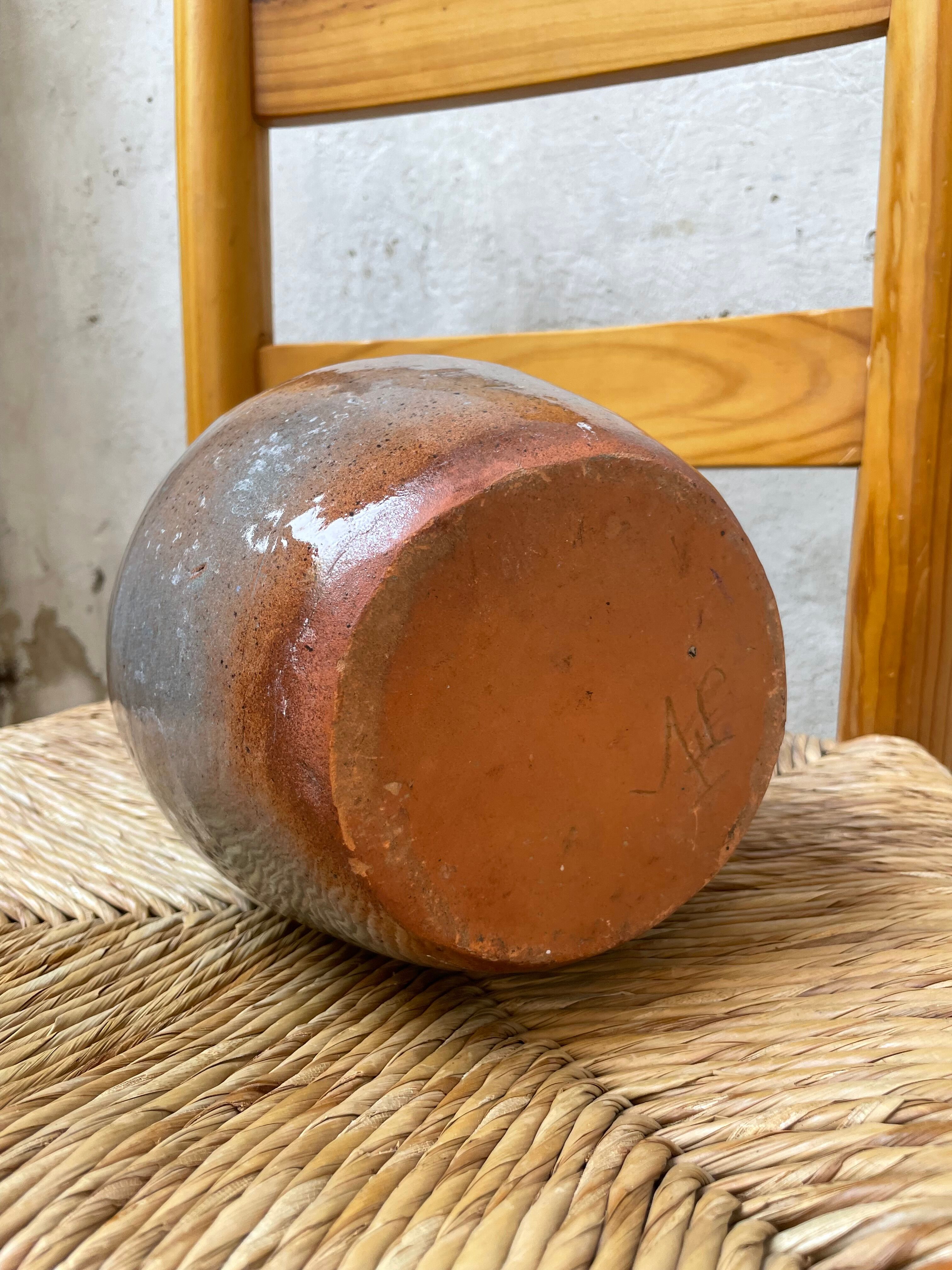 Glazed earth vase signed