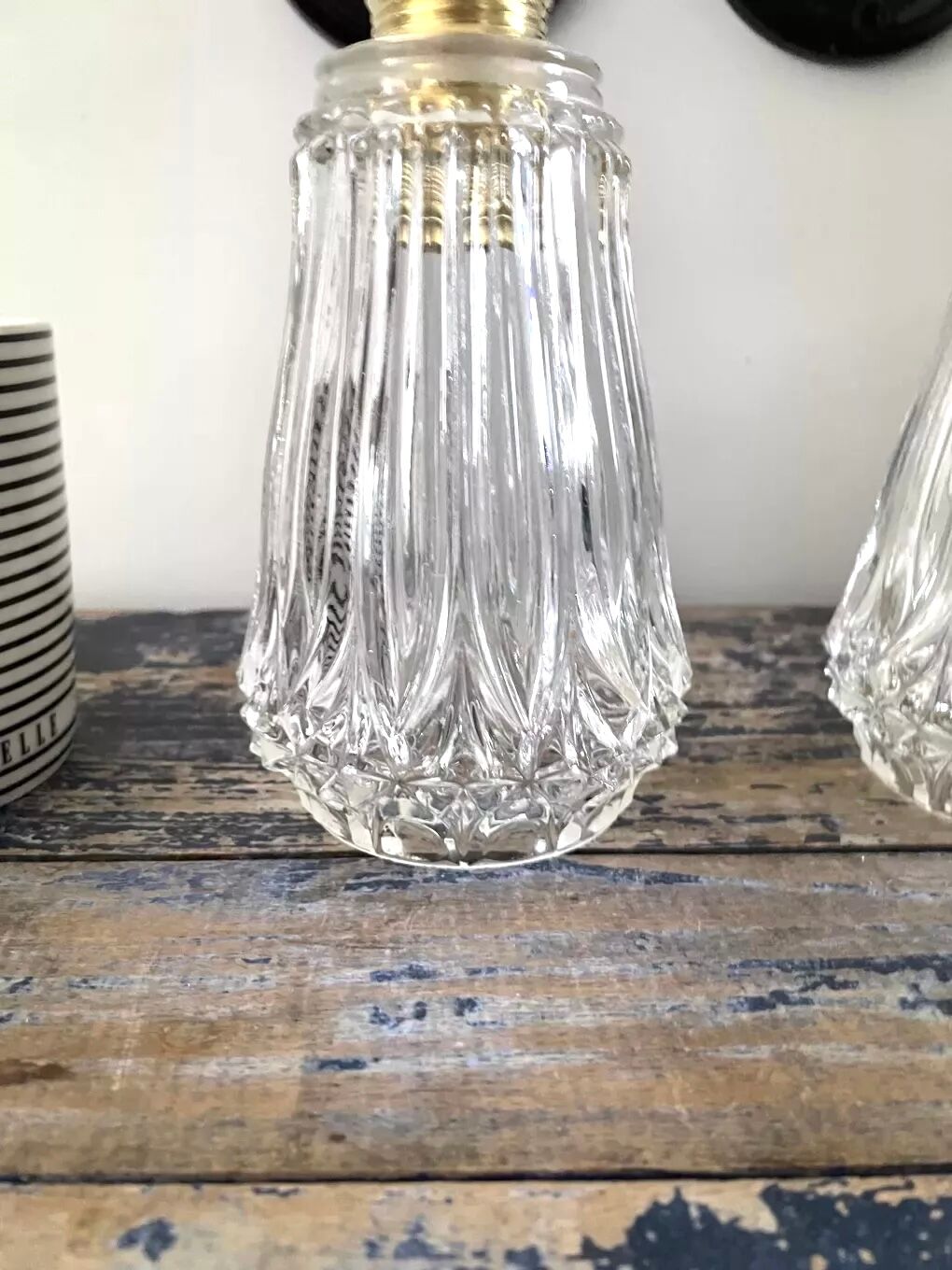 Set of two electrified chiseled glass sconces to nine